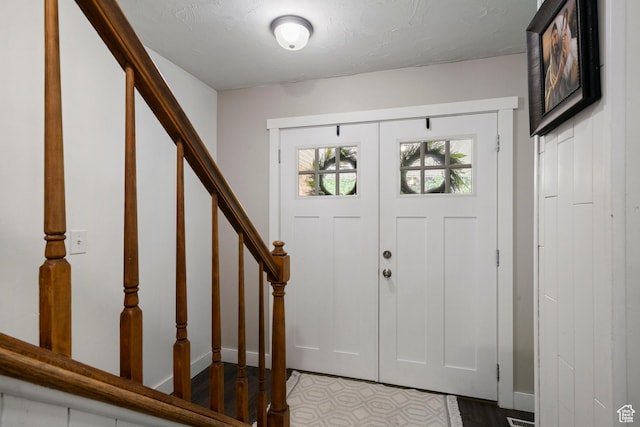 761 N Highland Blvd, Brigham City, UT 84302 - entrance foyer featuring baseboards and stairs