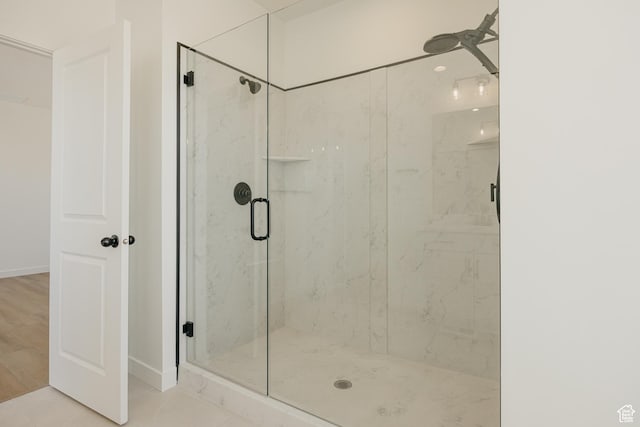 2597 E 360 S Unit 16, Spanish Fork, UT 84660 - bathroom featuring a marble finish shower and baseboards