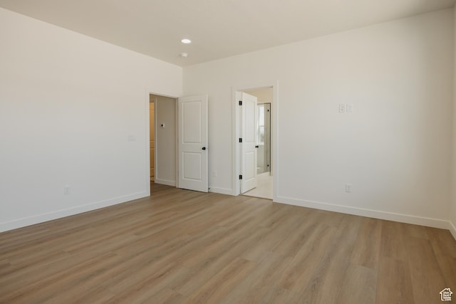 2597 E 360 S Unit 16, Spanish Fork, UT 84660 - unfurnished room featuring light wood finished floors, baseboards, and recessed lighting