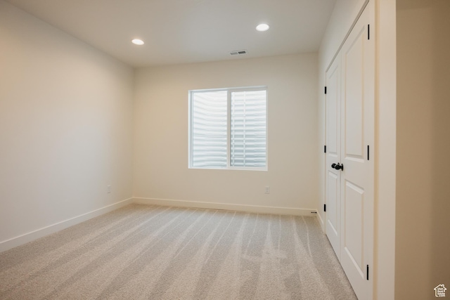 2597 E 360 S Unit 16, Spanish Fork, UT 84660 - unfurnished bedroom featuring baseboards, light colored carpet, recessed lighting, and a closet