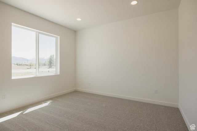 2597 E 360 S Unit 16, Spanish Fork, UT 84660 - empty room featuring light colored carpet, recessed lighting, and baseboards