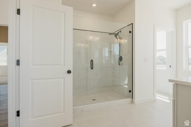 2597 E 360 S Unit 16, Spanish Fork, UT 84660 - full bathroom featuring a stall shower, baseboards, tile patterned flooring, recessed lighting, and vanity