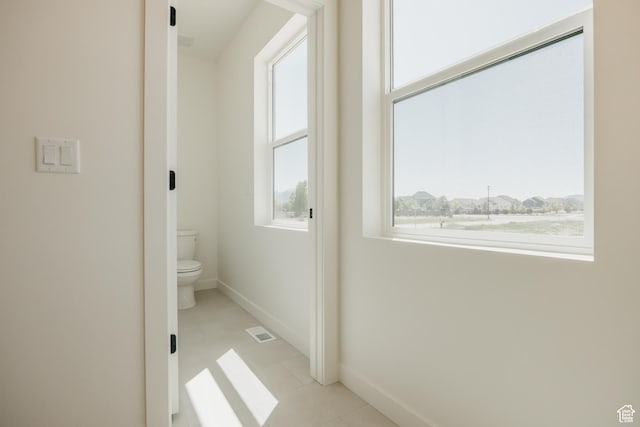 2597 E 360 S Unit 16, Spanish Fork, UT 84660 - bathroom with toilet, healthy amount of natural light, baseboards, and tile patterned flooring