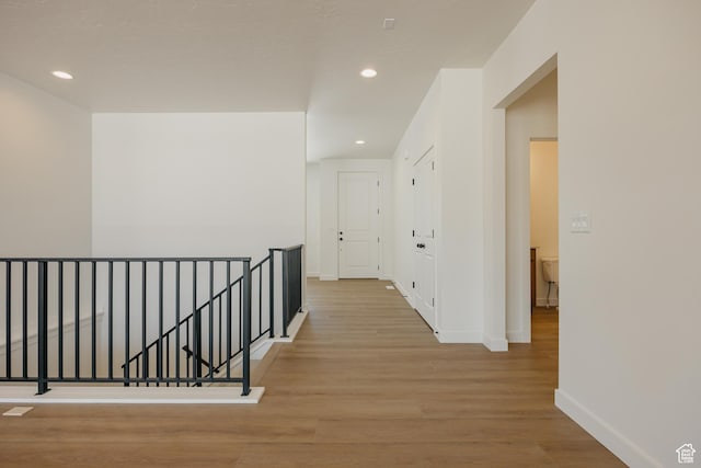 2597 E 360 S Unit 16, Spanish Fork, UT 84660 - hall featuring an upstairs landing, baseboards, wood finished floors, and recessed lighting
