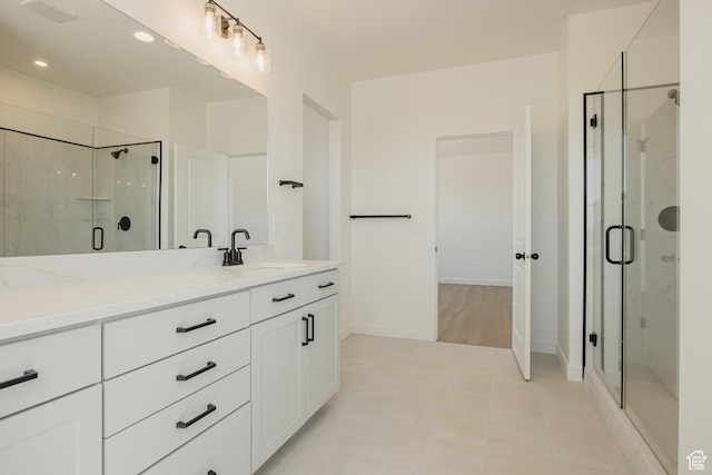 2597 E 360 S Unit 16, Spanish Fork, UT 84660 - full bath featuring vanity, a marble finish shower, tile patterned flooring, baseboards, and recessed lighting