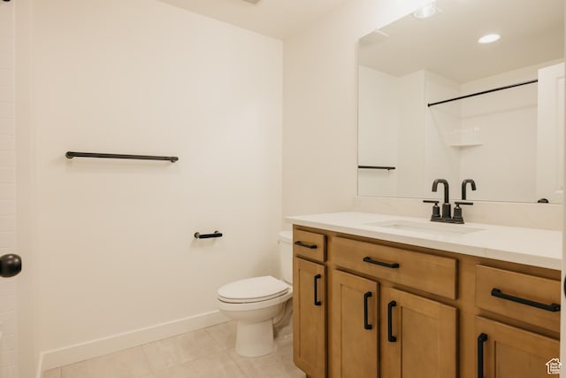 2597 E 360 S Unit 16, Spanish Fork, UT 84660 - bathroom with vanity, tile patterned flooring, toilet, a shower, and baseboards