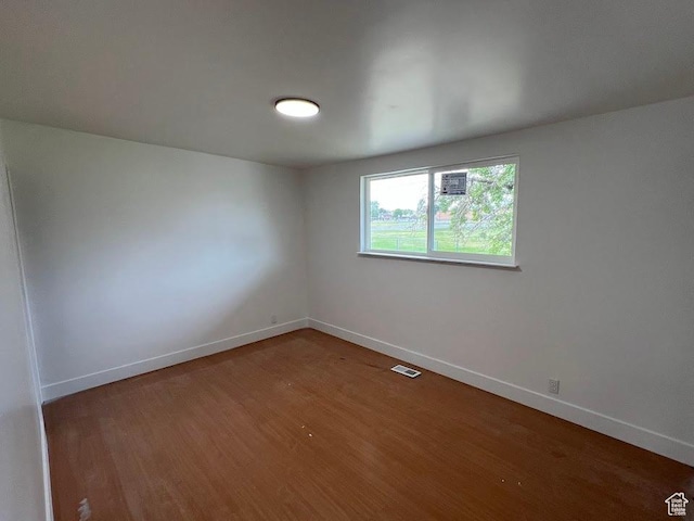 3222 W Tess Ave S, West Valley City, UT 84119 - spare room with baseboards and wood finished floors