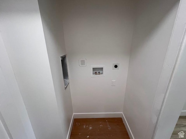 3222 W Tess Ave S, West Valley City, UT 84119 - laundry room with electric dryer hookup, hookup for a washing machine, wood finished floors, and baseboards