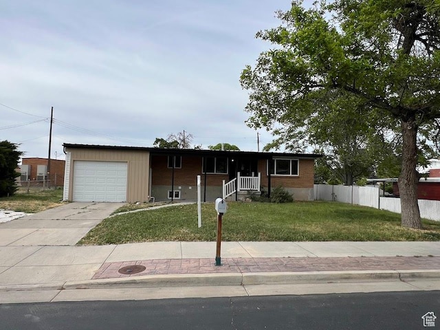 3222 W Tess Ave S, West Valley City, UT 84119 - single story home featuring an attached garage and concrete driveway