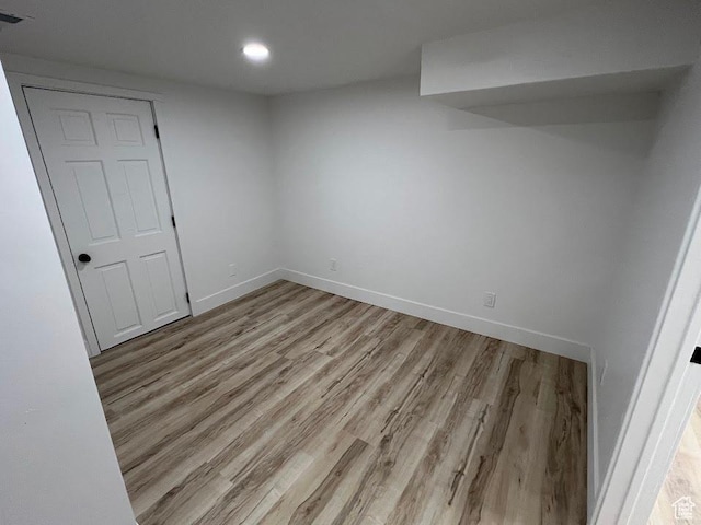 3222 W Tess Ave S, West Valley City, UT 84119 - finished below grade area featuring light wood-style flooring, baseboards, and recessed lighting