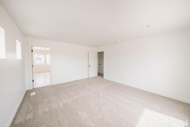 1089 E Blackfeet Dr Unit 518, Eagle Mountain, UT 84005 - unfurnished room featuring light carpet and baseboards