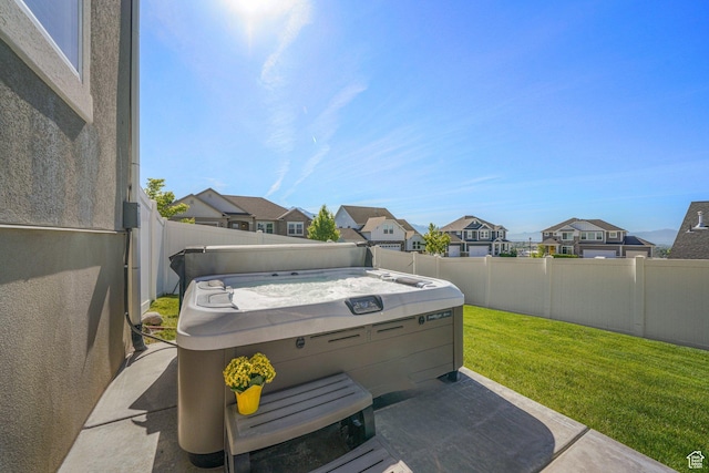413 W 4100 N, Lehi, UT 84043 - view of patio / terrace featuring a hot tub and a residential view
