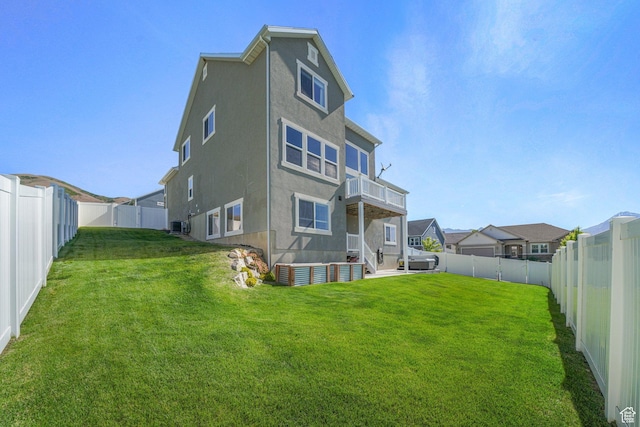 413 W 4100 N, Lehi, UT 84043 - rear view of house with stucco siding, central air condition unit, a balcony, and a residential view