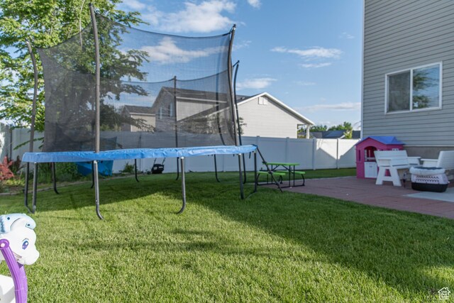1428 N Reese Dr, Provo, UT 84601 - view of yard with a trampoline and a patio area