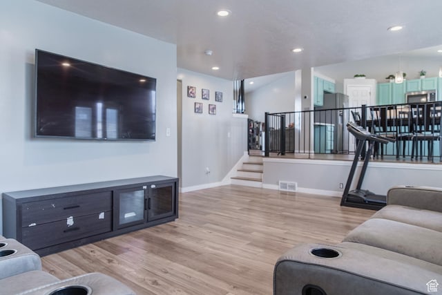 1428 N Reese Dr, Provo, UT 84601 - living area with light wood-type flooring, stairway, baseboards, and recessed lighting