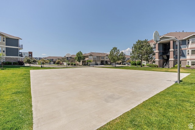 116 E Resaca Unit F3, Midvale, UT 84070 - view of sport court with community basketball court, a residential view, and a yard