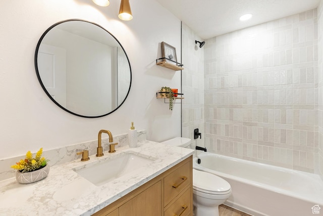 116 E Resaca Unit F3, Midvale, UT 84070 - bathroom with toilet, vanity, and bathtub / shower combination