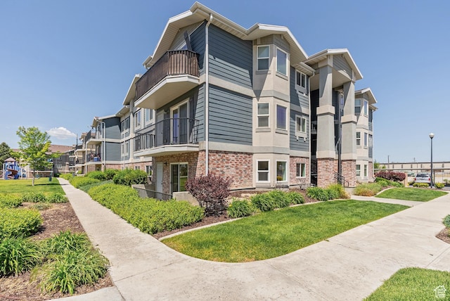 116 E Resaca Unit F3, Midvale, UT 84070 - view of building exterior with a residential view