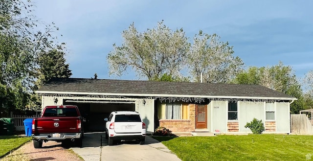 6439 S Clernates Dr, West Jordan, UT 84081 - ranch-style home with an attached garage, brick siding, a shingled roof, and concrete driveway