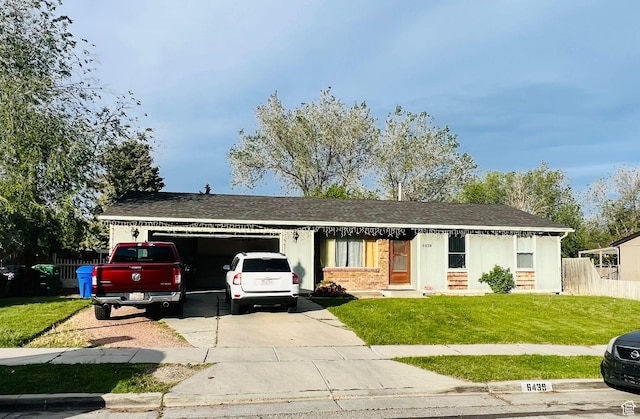 6439 S Clernates Dr, West Jordan, UT 84081 - ranch-style home with a garage, concrete driveway, roof with shingles, and brick siding