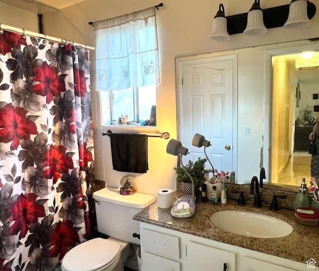 6439 S Clernates Dr, West Jordan, UT 84081 - bathroom featuring vanity, toilet, and a shower with shower curtain