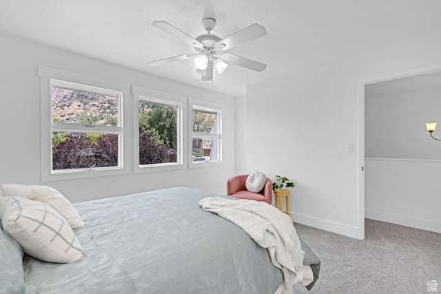 1507 Hudson St, Ogden, UT 84404 - carpeted bedroom with baseboards and a ceiling fan