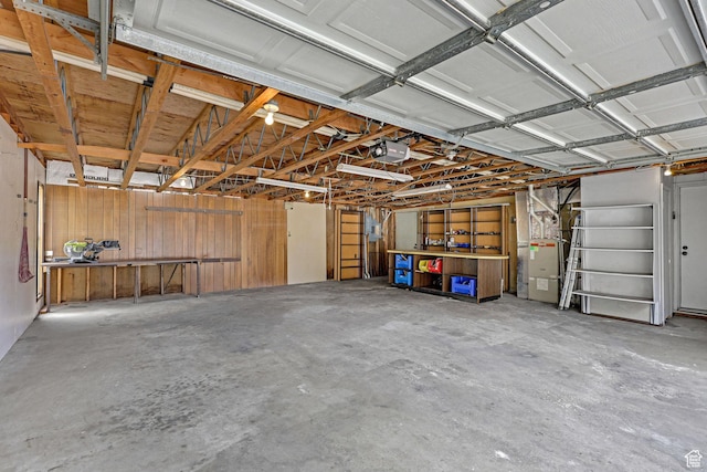 1507 Hudson St, Ogden, UT 84404 - garage with a workshop area, a garage door opener, and heating unit