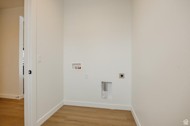 3537 E 1120 S Unit 110, Spanish Fork, UT 84660 - laundry room with hookup for an electric dryer, hookup for a washing machine, light wood-type flooring, and baseboards