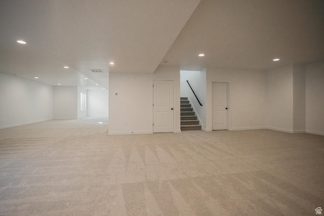 3537 E 1120 S Unit 110, Spanish Fork, UT 84660 - finished below grade area with stairway, recessed lighting, light colored carpet, and baseboards