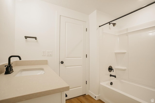 3537 E 1120 S Unit 110, Spanish Fork, UT 84660 - bathroom featuring bathtub / shower combination, wood finished floors, and vanity