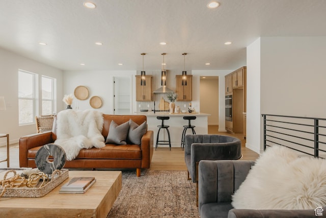 3537 E 1120 S Unit 110, Spanish Fork, UT 84660 - living room featuring recessed lighting and light wood-type flooring