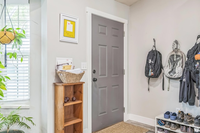 1135 E 220 N, Heber City, UT 84032 - entrance foyer featuring baseboards, healthy amount of natural light, and wood finished floors
