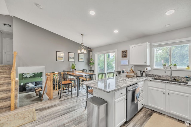 1135 E 220 N, Heber City, UT 84032 - kitchen with dishwasher, a sink, a peninsula, white cabinets, and light wood-style flooring