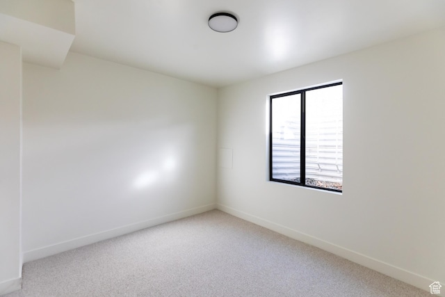 5348 W 10700 N Unit 2, Highland, UT 84003 - empty room featuring carpet floors and baseboards