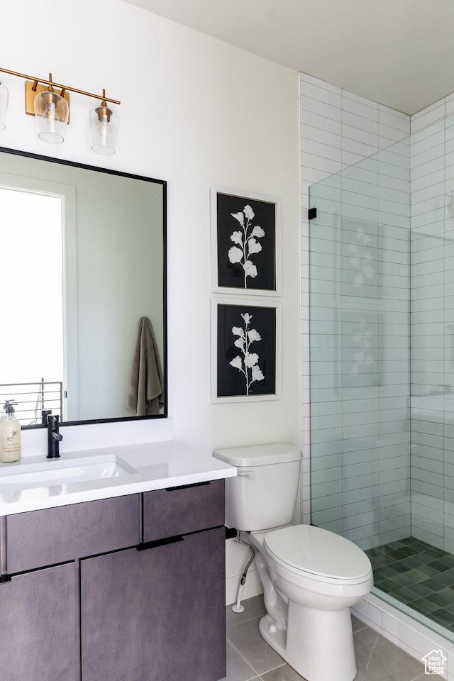 5348 W 10700 N Unit 2, Highland, UT 84003 - bathroom with tile patterned flooring, vanity, toilet, and a shower stall