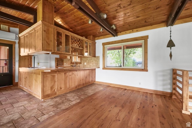 365 Parkview Dr, Summit Park, UT 84098 - kitchen with wooden ceiling, baseboards, glass insert cabinets, a wall mounted AC, and a peninsula