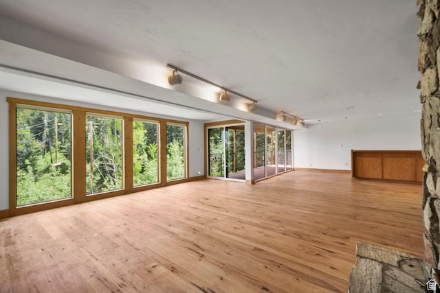 365 Parkview Dr, Summit Park, UT 84098 - unfurnished living room with light wood finished floors and baseboards
