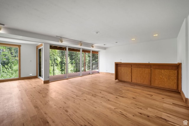 365 Parkview Dr, Summit Park, UT 84098 - unfurnished living room featuring plenty of natural light, light wood finished floors, baseboards, and recessed lighting