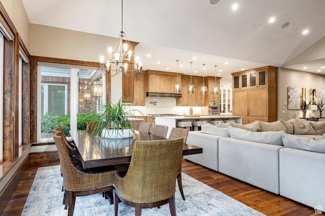 2177 W 9240 S, West Jordan, UT 84088 - dining space featuring dark wood finished floors, a chandelier, high vaulted ceiling, and recessed lighting