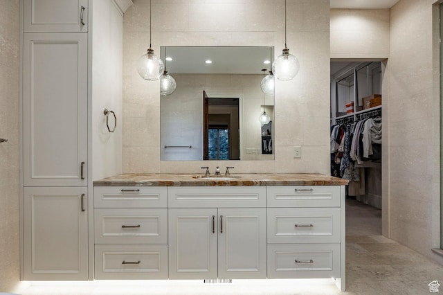 2177 W 9240 S, West Jordan, UT 84088 - bathroom with vanity and a walk in closet