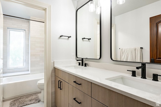 2177 W 9240 S, West Jordan, UT 84088 - bathroom with toilet, double vanity, healthy amount of natural light, and tub / shower combination