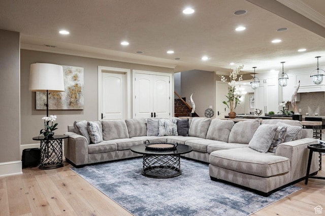 2177 W 9240 S, West Jordan, UT 84088 - living area with ornamental molding, stairway, light wood-style floors, recessed lighting, and baseboards