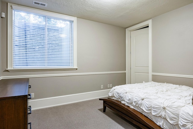 2177 W 9240 S, West Jordan, UT 84088 - carpeted bedroom featuring a textured ceiling and multiple windows