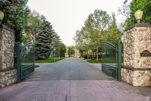 2177 W 9240 S, West Jordan, UT 84088 - view of asphalt driveway featuring a gate and a gated entry