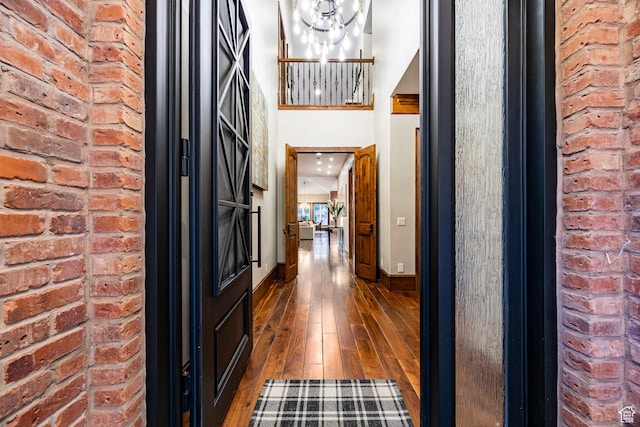 2177 W 9240 S, West Jordan, UT 84088 - entryway featuring dark wood-style flooring, baseboards, and a chandelier