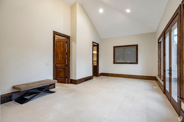 2177 W 9240 S, West Jordan, UT 84088 - empty room with high vaulted ceiling, french doors, baseboards, and recessed lighting