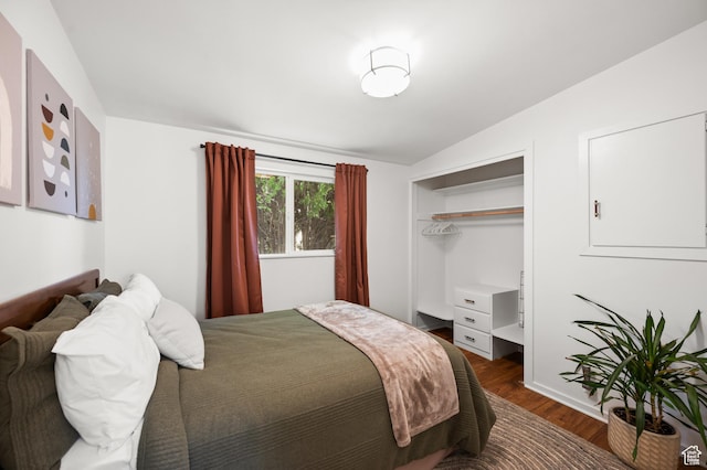 3681 S Terrace Heights Rd, Millcreek, UT 84109 - bedroom featuring dark wood-style floors, lofted ceiling, and a closet