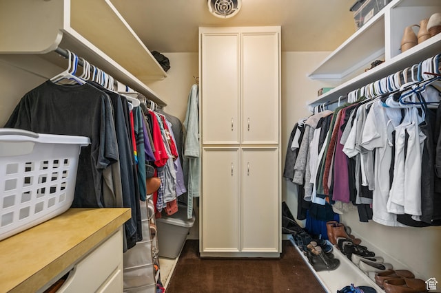 3681 S Terrace Heights Rd, Millcreek, UT 84109 - spacious closet featuring dark colored carpet
