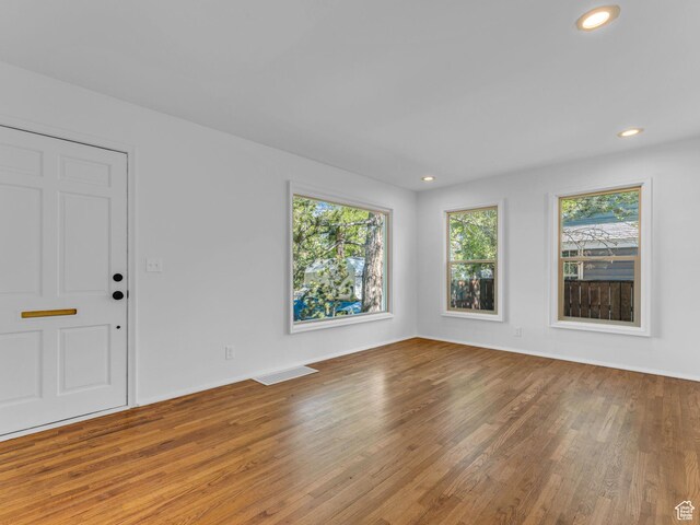2811 S Filmore St, Salt Lake City, UT 84106 - spare room with wood finished floors, recessed lighting, and baseboards