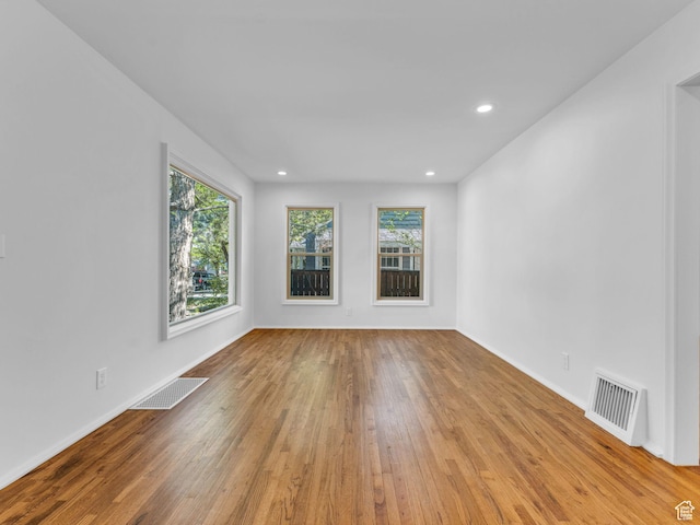 2811 S Filmore St, Salt Lake City, UT 84106 - unfurnished room featuring wood finished floors, baseboards, and recessed lighting